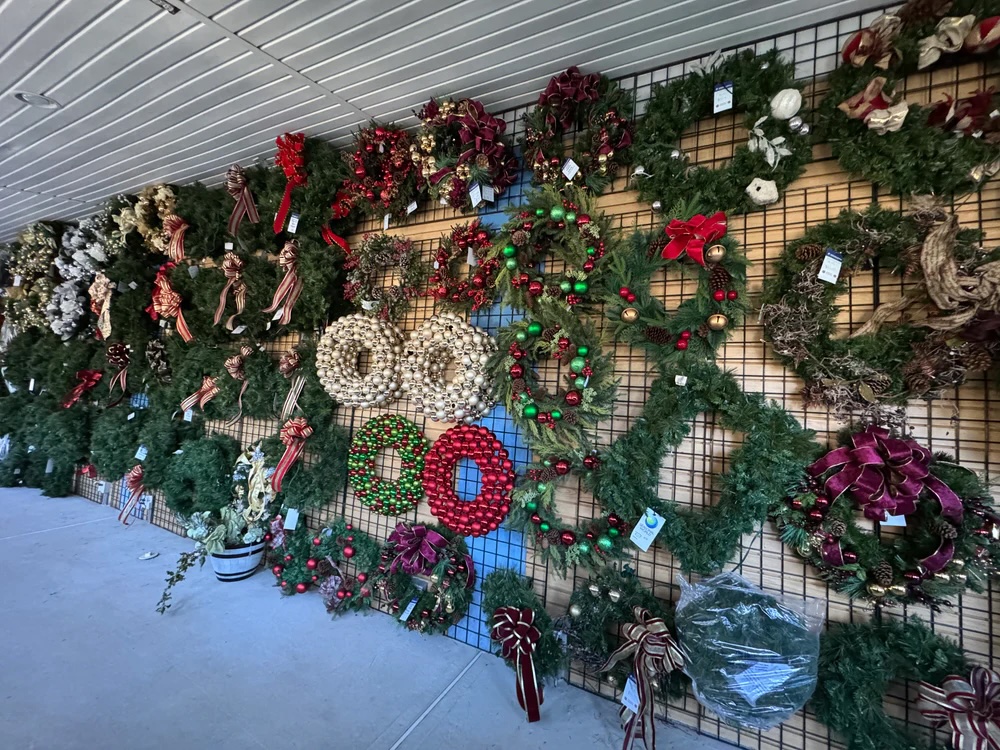 Fresh Christmas garland and custom wreaths